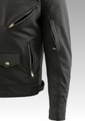 Black jacket with zippers and buttons on a light gray background